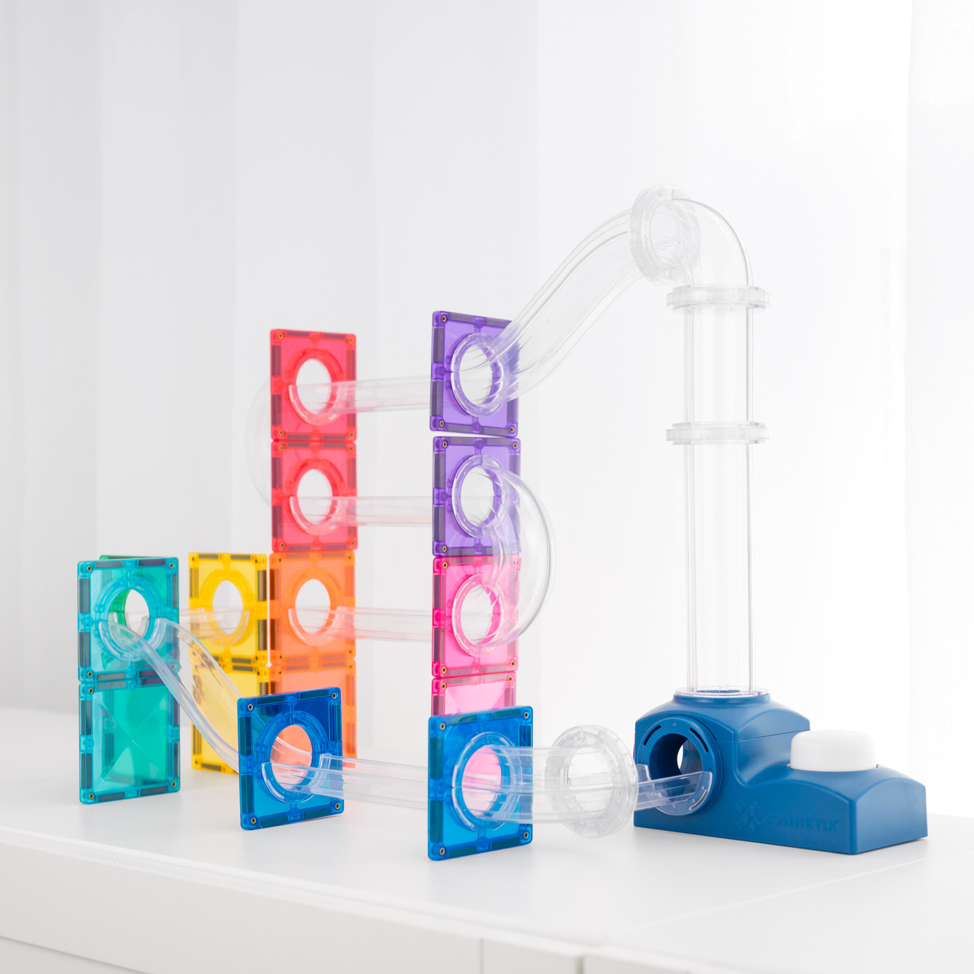 The Connetix Ball Run - Launcher Pack 47pc assembled on a white table