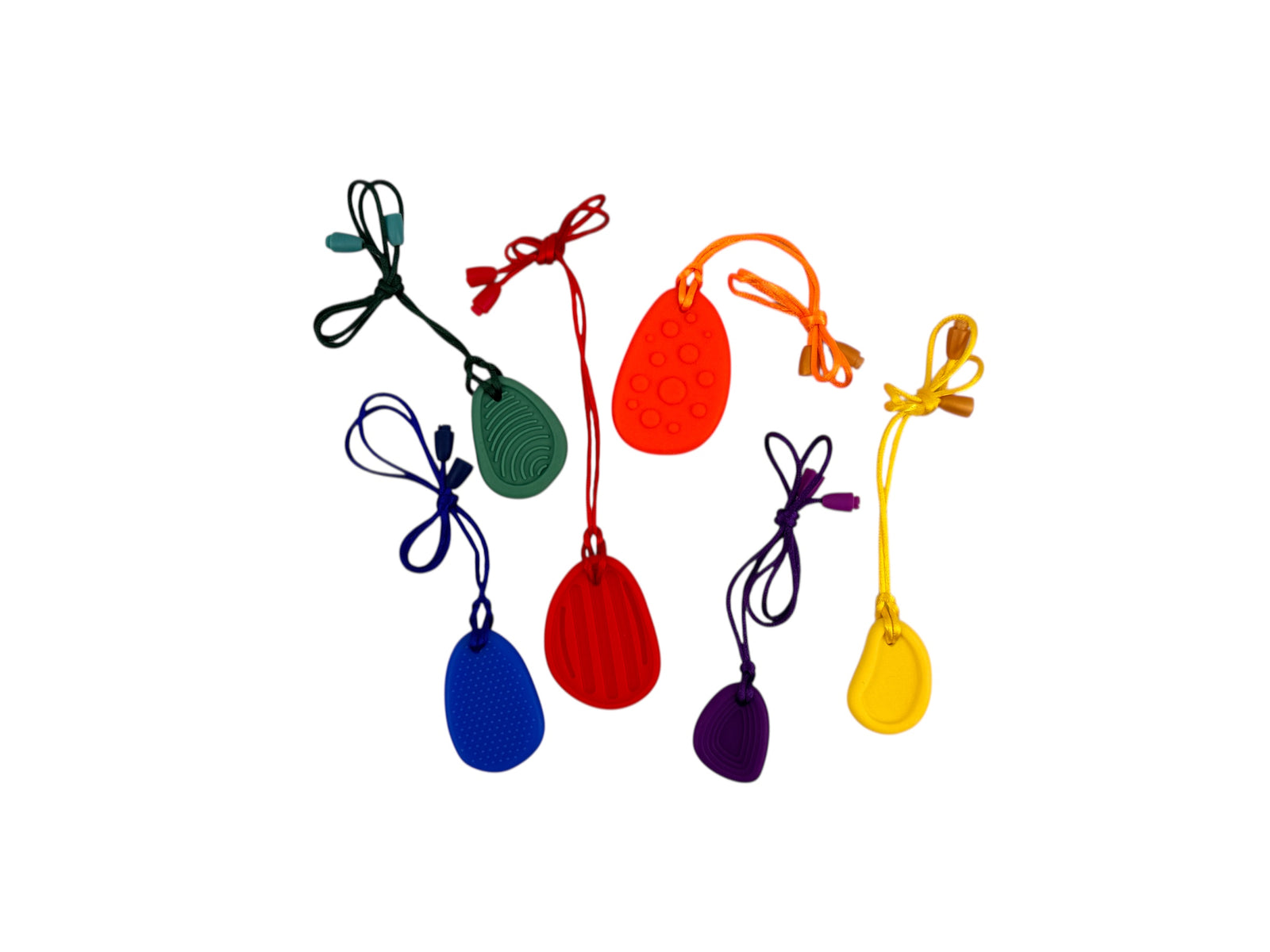 set of colourful Chewy Charms Necklace Chew - Worry Stones pictured on white background