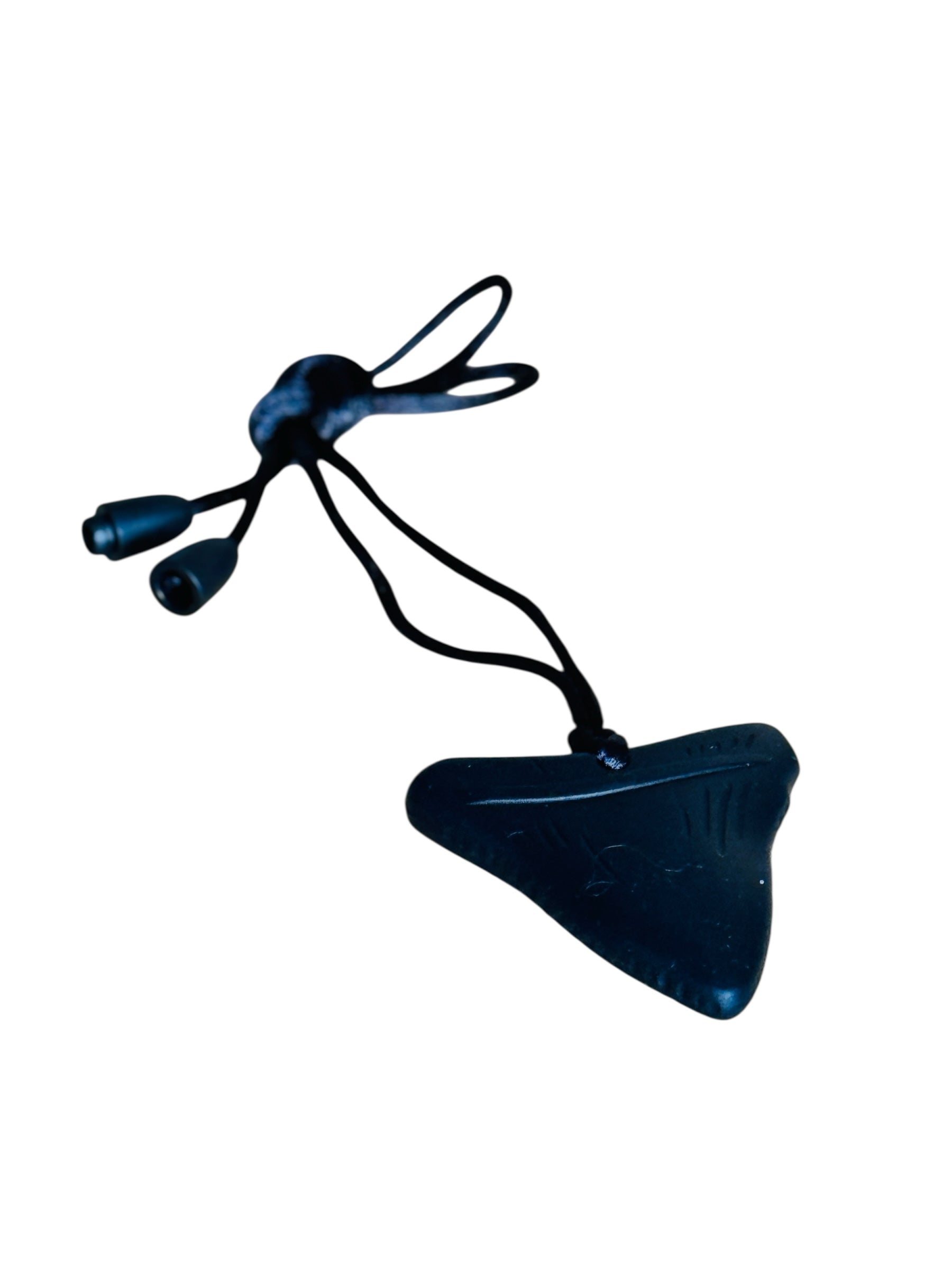 the Chewy Charms Necklace Chew - Shark Tooth pictured on a white background