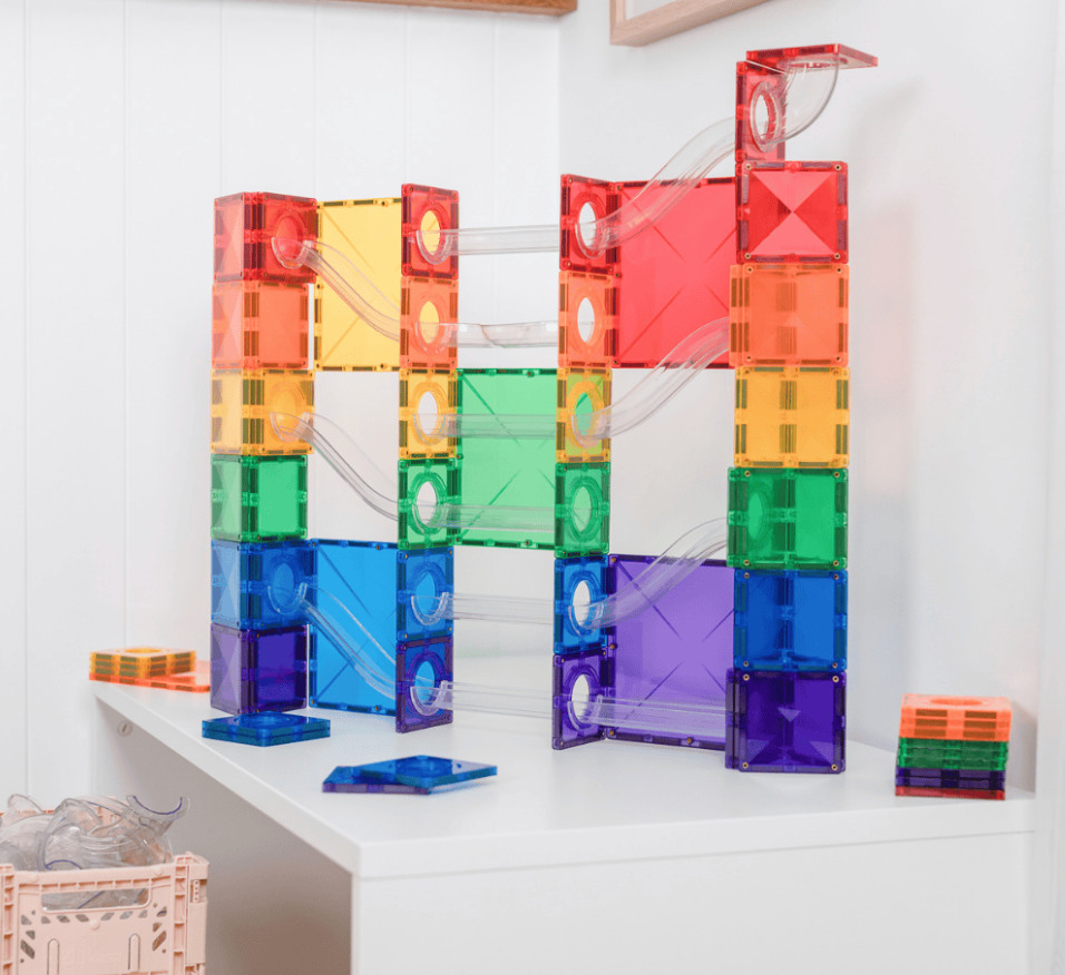 the Connetix Super Ball Run Pack - Rainbow 134pc installed on white table