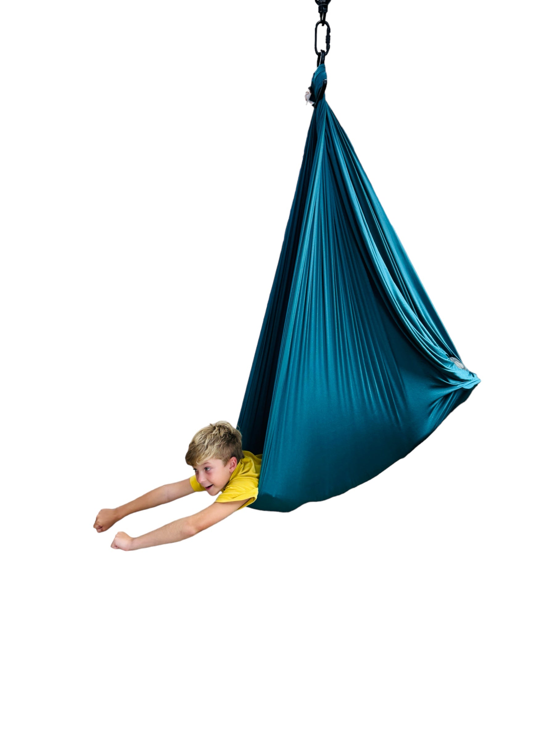 a young boy playing in the Deluxe Compression Sensory Swing