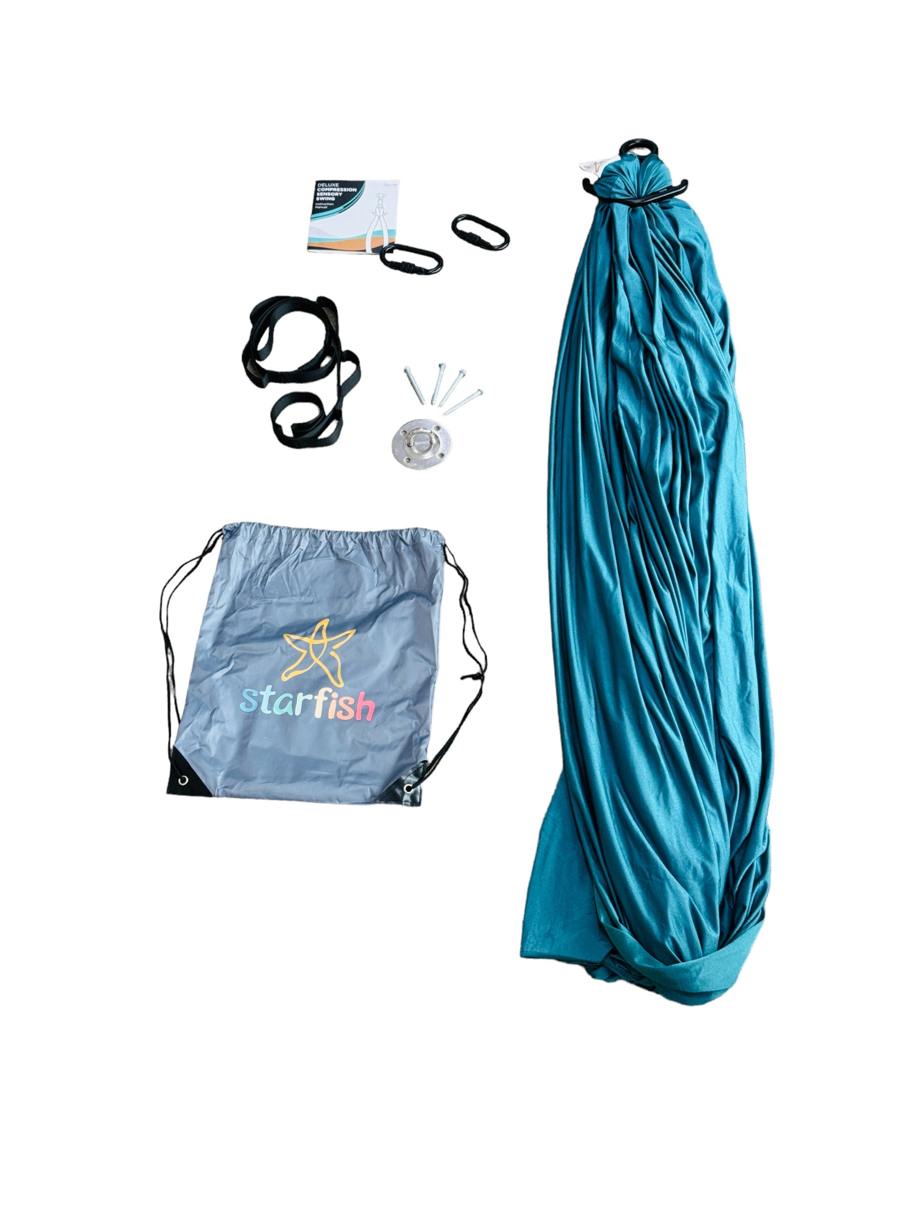 the Deluxe Compression Sensory Swing and all of it&#39;s contents pictured on a white background