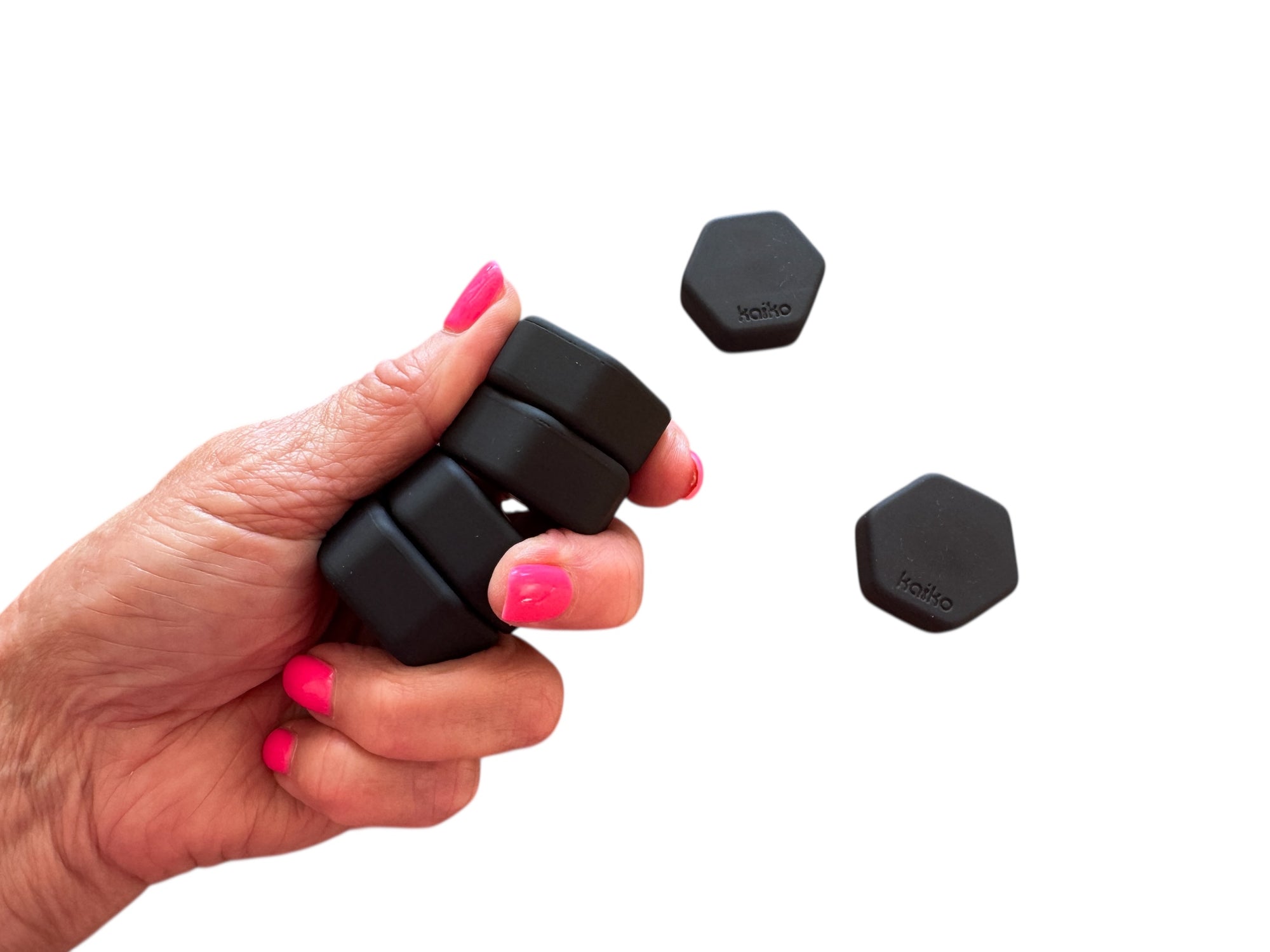 a hand holding the Kaiko Magstak - core pieces