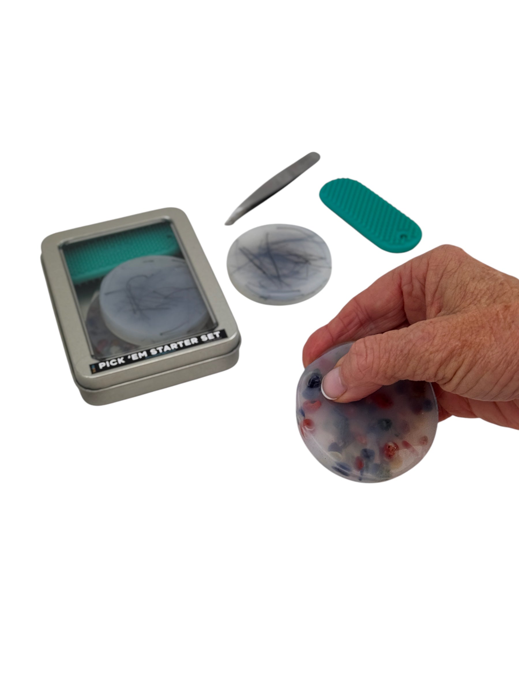 The Kaiko Pick &#39;em Starter Set pictured on white background and hand golding one of the pcs