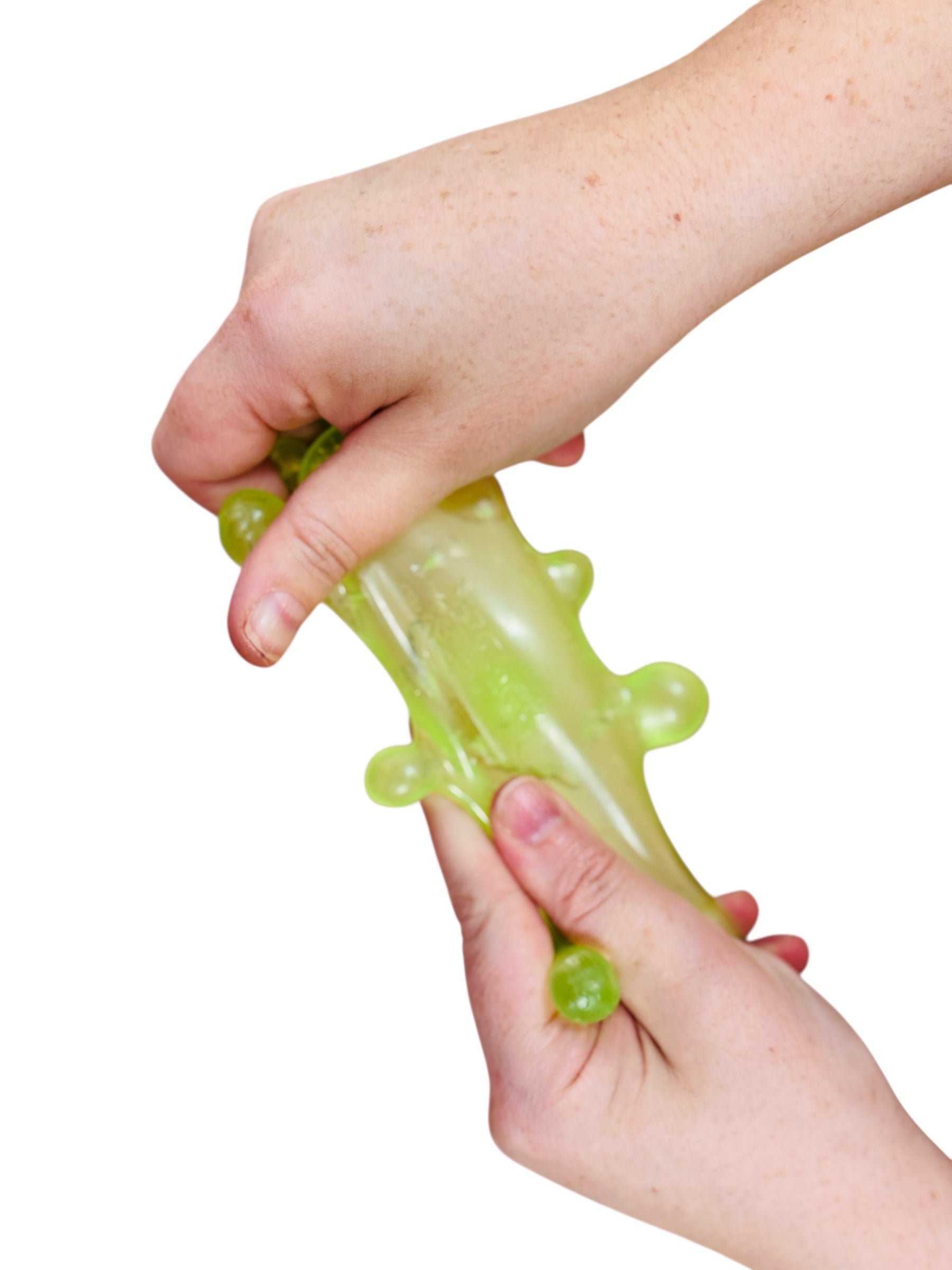 a hand stretching the green Nee Doh Stress Ball - Sploot Splat