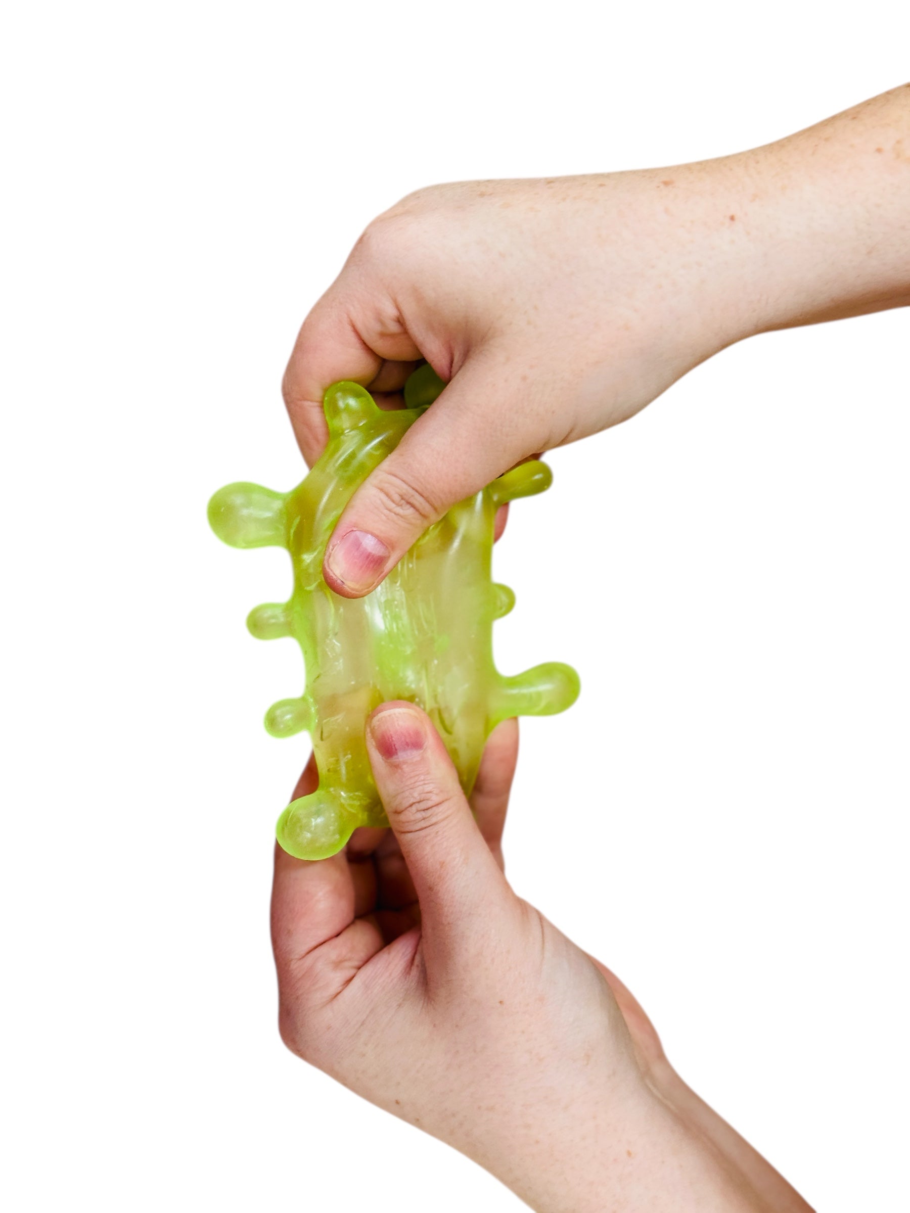 a hand holding the green Nee Doh Stress Ball - Sploot Splat 