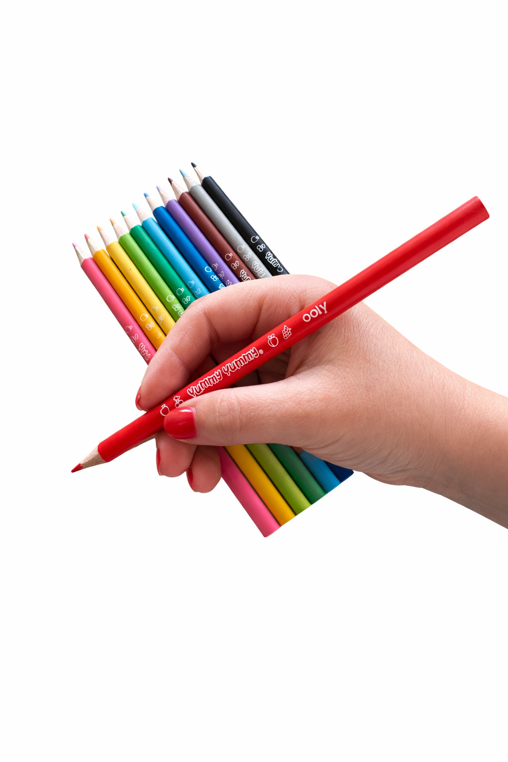 a hand holding the red colour pencil from the Ooly Yummy Yummy Fruit Scented Coloured Pencils pack