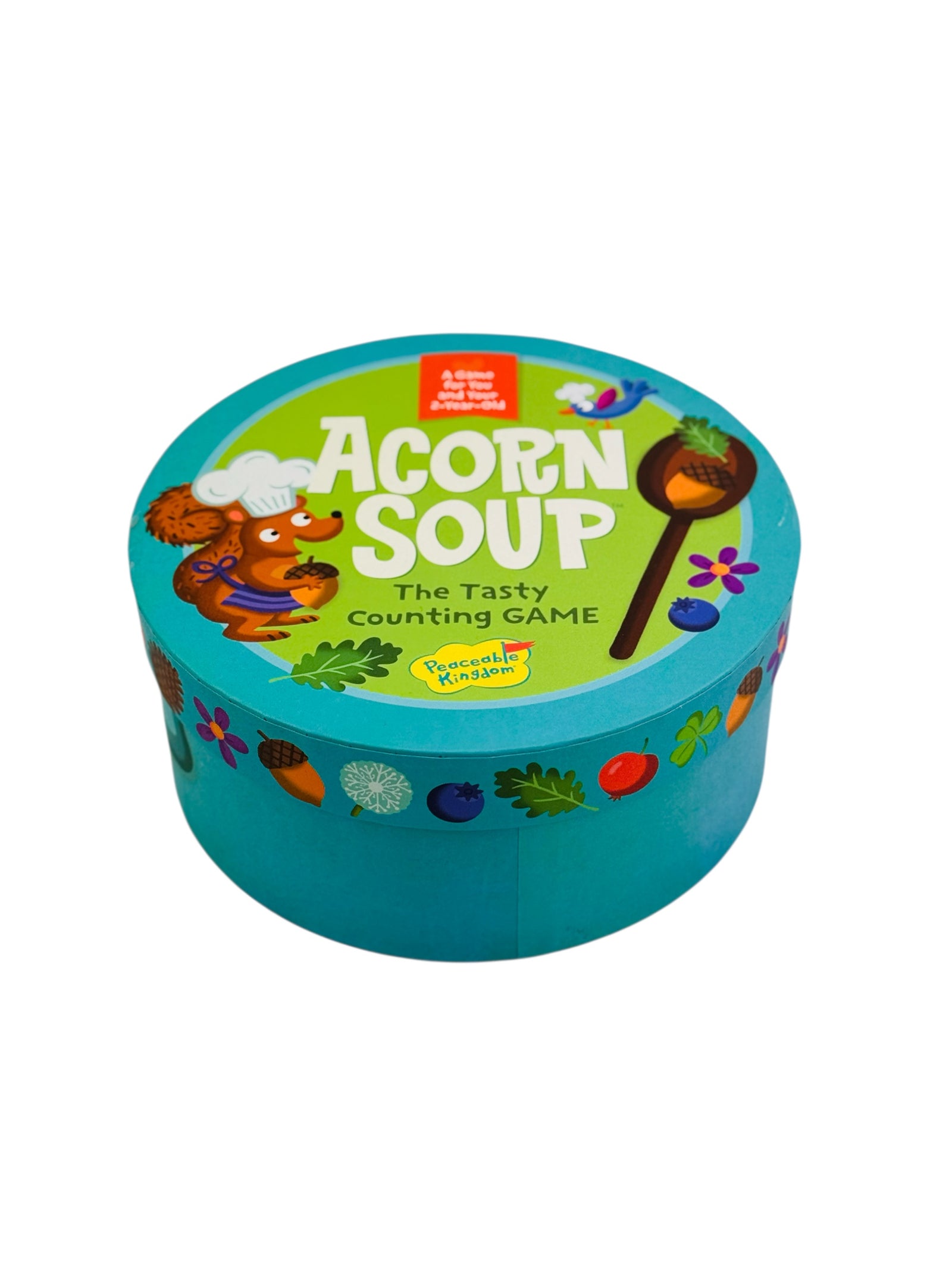 Children's game box titled 'Acorn Soup' by Peacable kingdom with colourful design on a white background