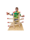 a young boy playing the Fagus Wooden Marble Run XL