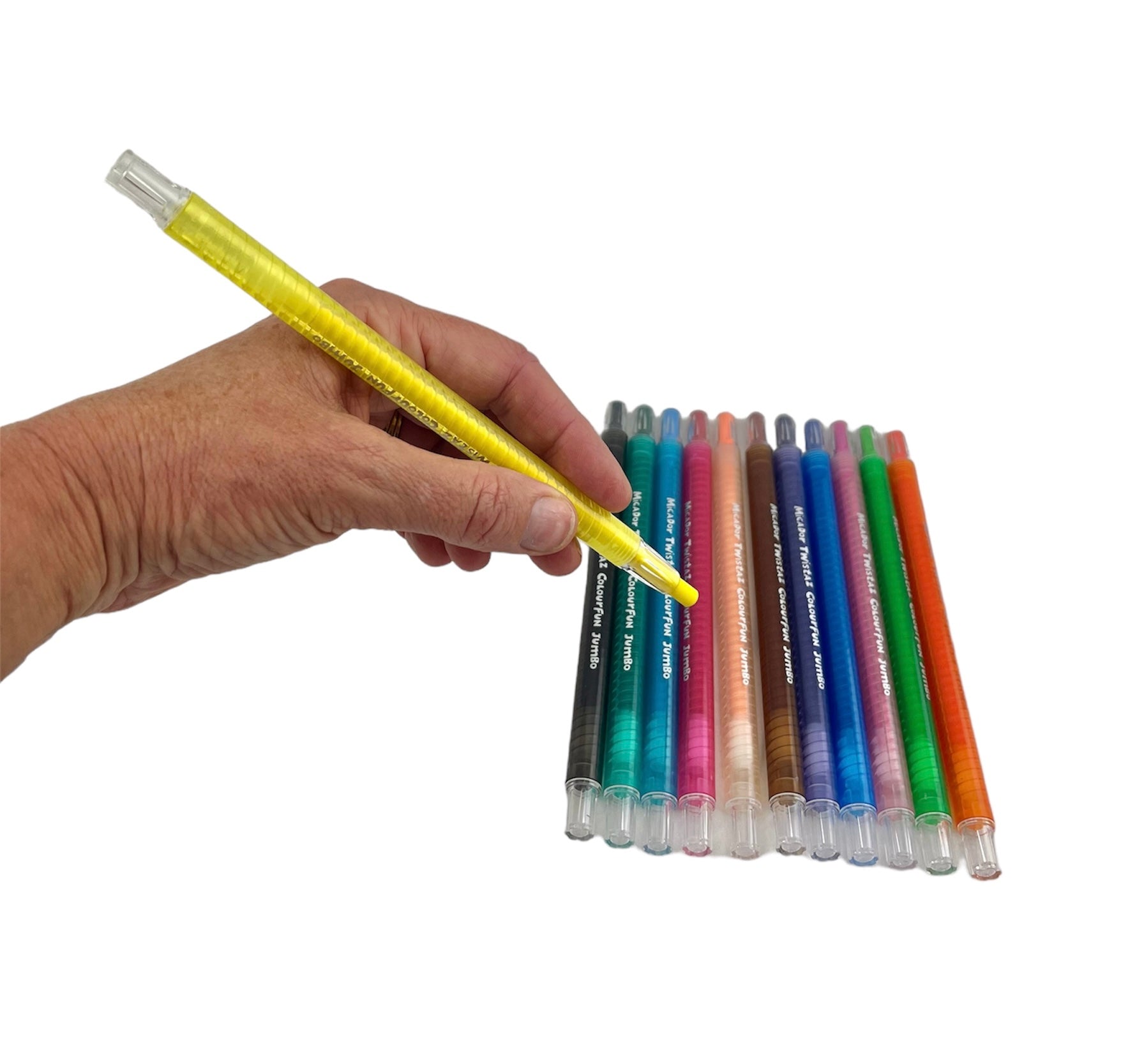 a hand holding the yellow crayon in front of the rest of the pack from the Micador Twistaz Colourfun Jumbo Crayons
