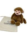 The 2kg Weighted Monkey pictured sitting on it&#39;s bag