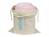 the pink Woosah Weighted Blanket - Adult popping out of it&#39;s white carrying sack