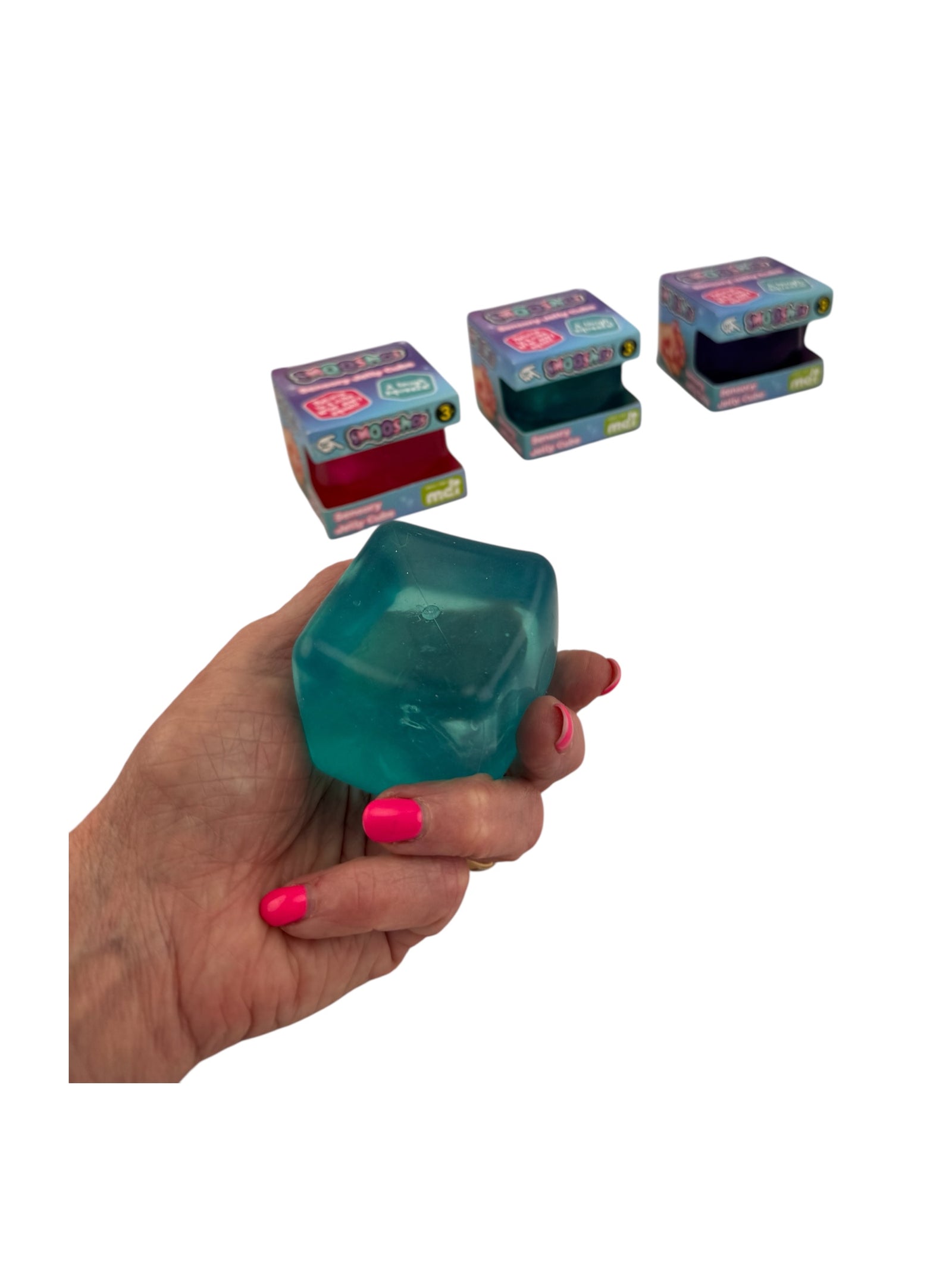 A hand holding the blue Smooshos Jelly Stress Cube pictured on a white background