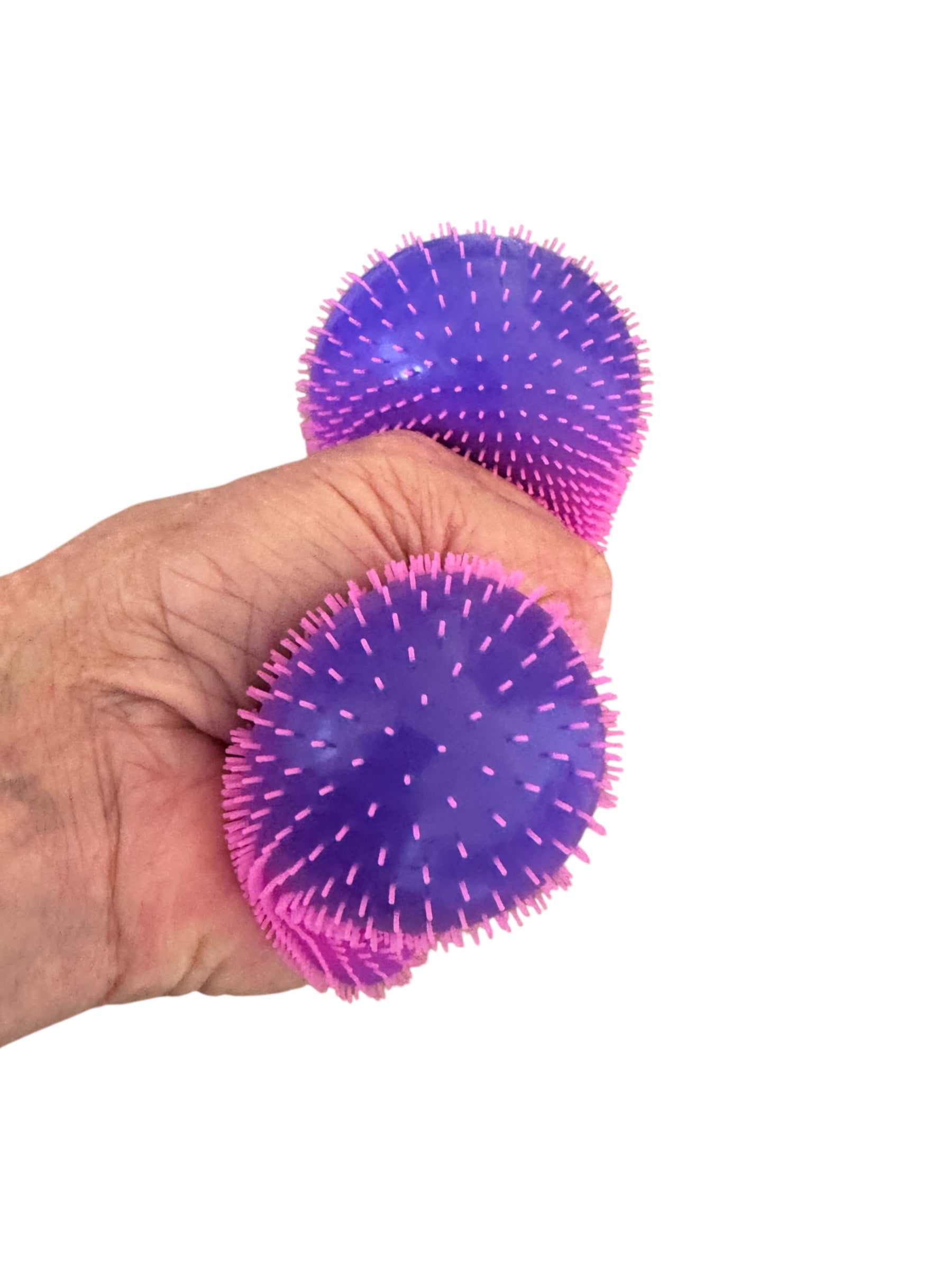 The Smooshos Squishy - Colour Change Furry Ball squeezed