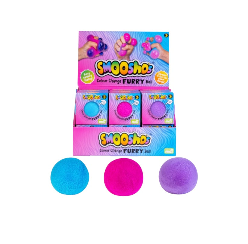 Smooshos color change furry ball packaging with three balls displayed in front.