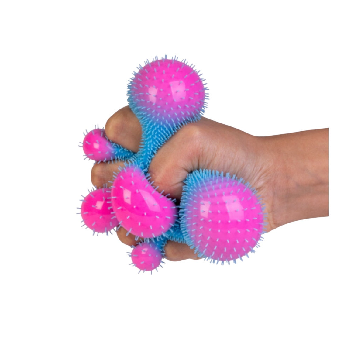 The Smooshos Squishy - Colour Change Furry Ball squeezed and pictured on a white background