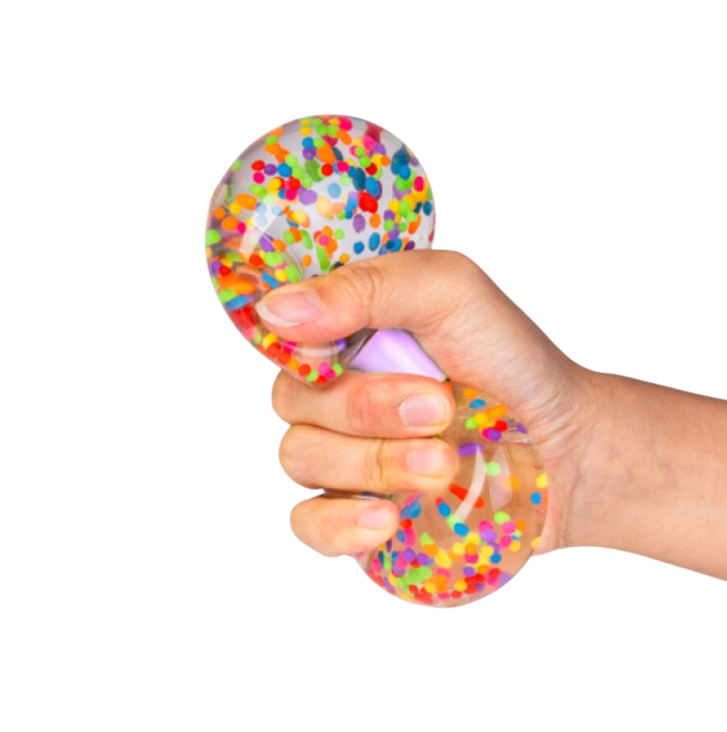 a hand squeezing the Smooshos Squishy Dumbbell - Beads