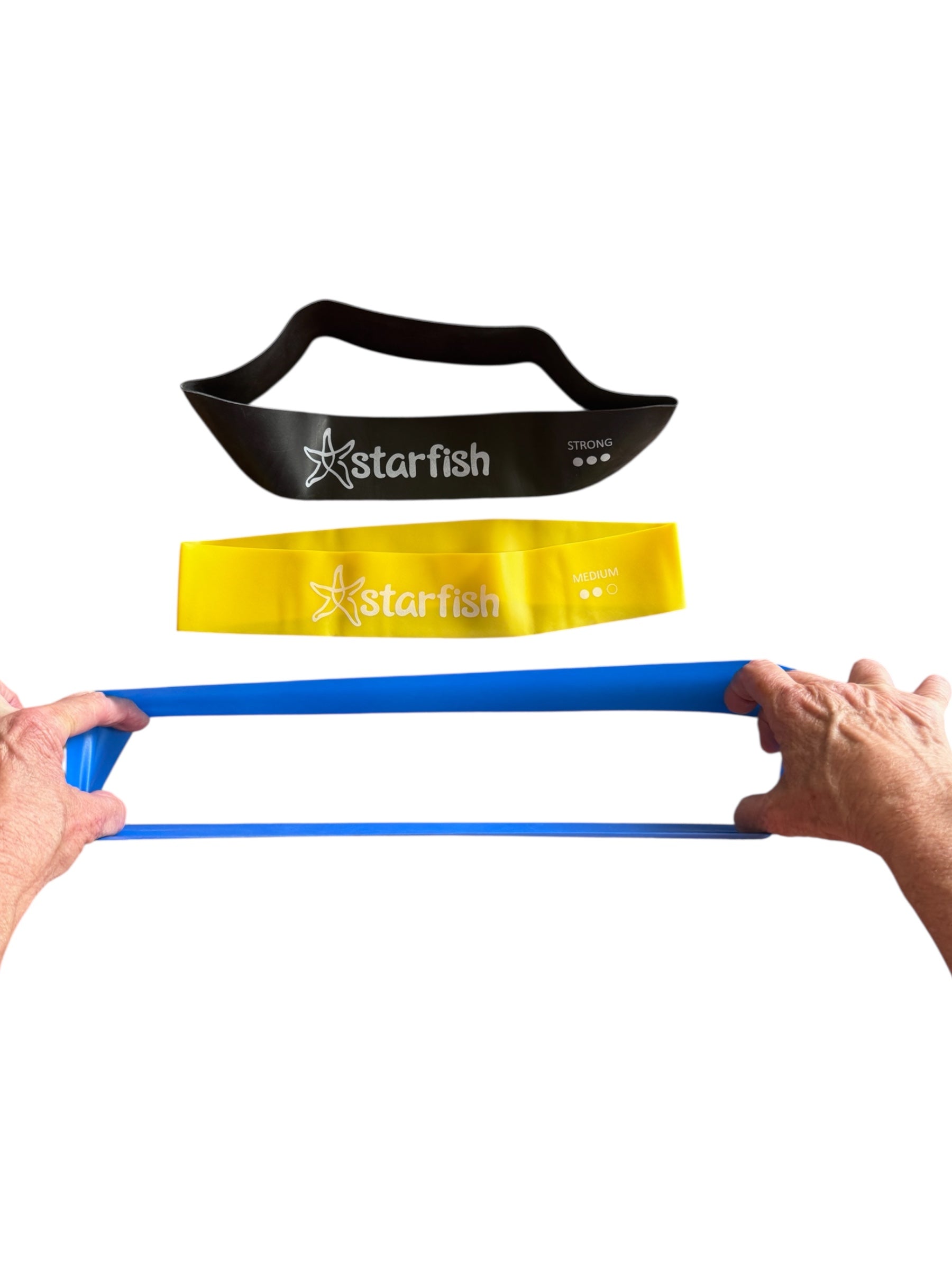 Two classroom resistance bands with 'Starfish' branding held by hands on a white background