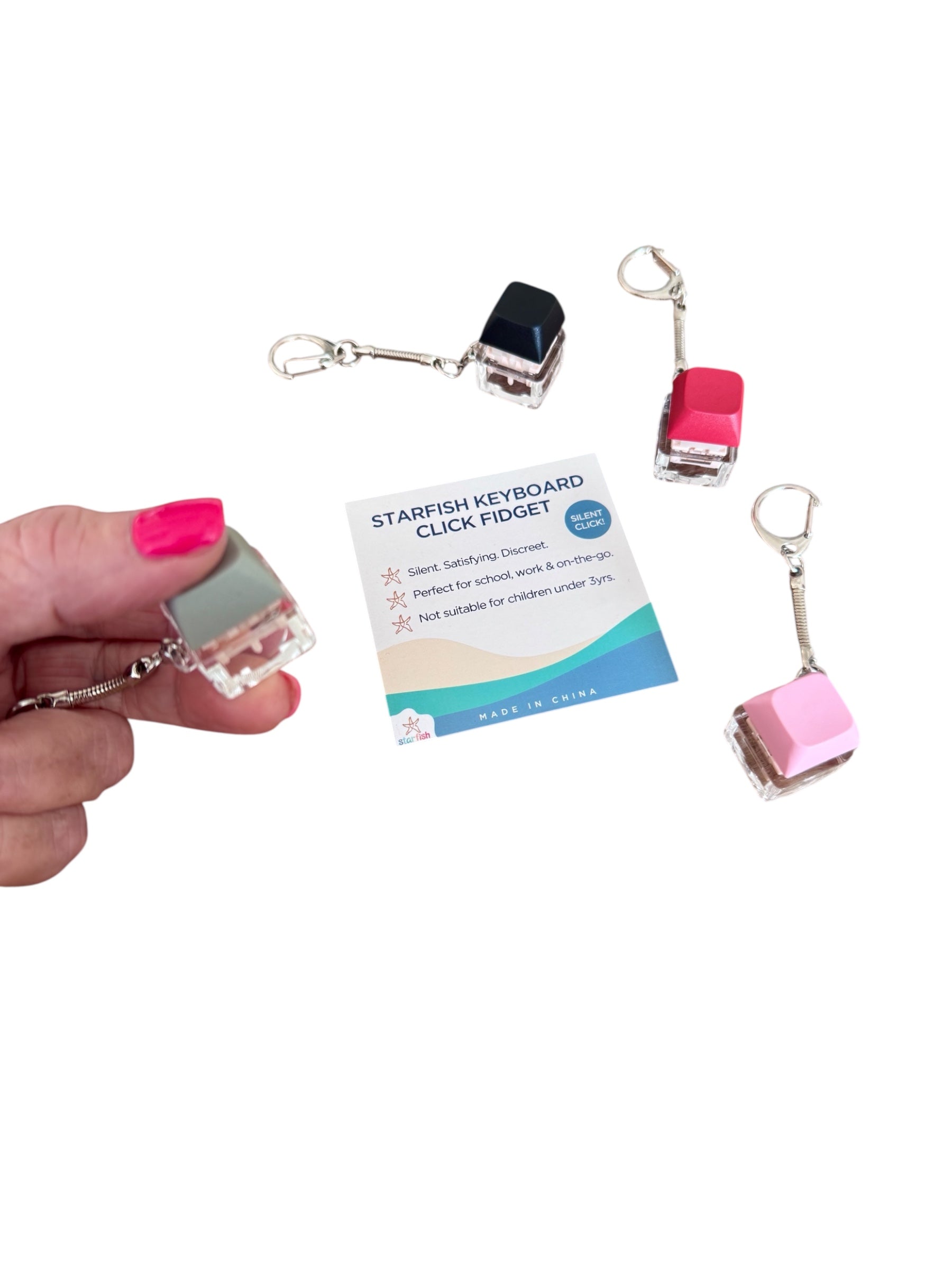 Starfish keyboard click fidgets with keychains on a white background