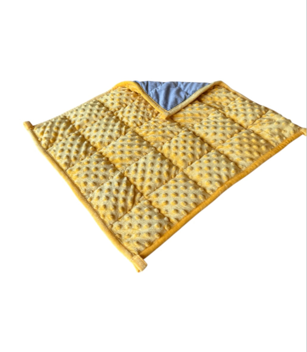 The yellow (sand) Starfish Weighted Lap Pad - 2.25kg pictured on a white background