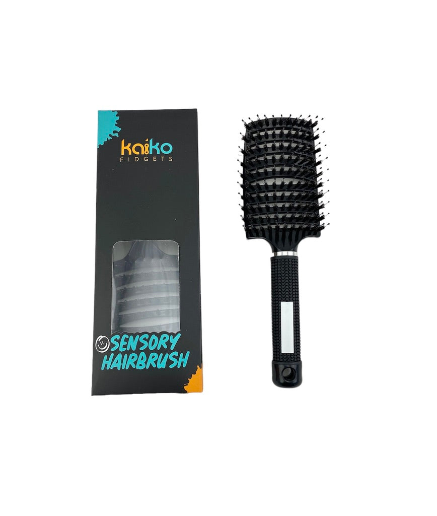 the black Kaiko Sensory Hairbrush