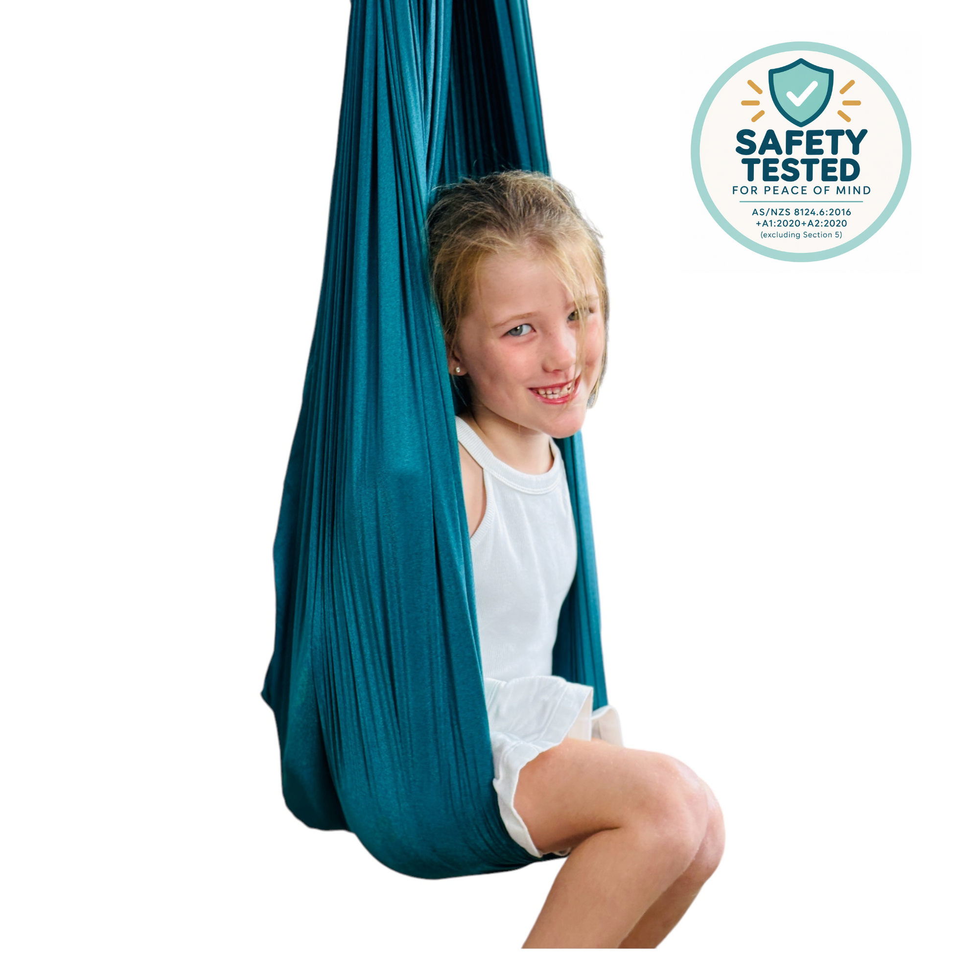 a young girl sitting in the Starfish Deluxe Compression Sensory Swing