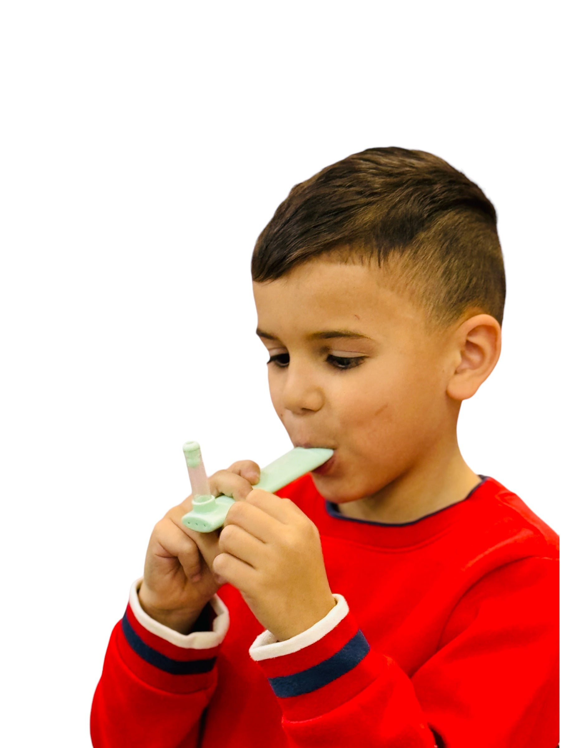 a young boy breathing into the Webe Kalm Calming Breath tool
