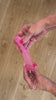 A video demonstration of the Smooshos Super Squeeze Glow - Stretch Dino