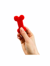 a hand holding the red bone from the Ruff&#39;s House Teaching Tactile Set