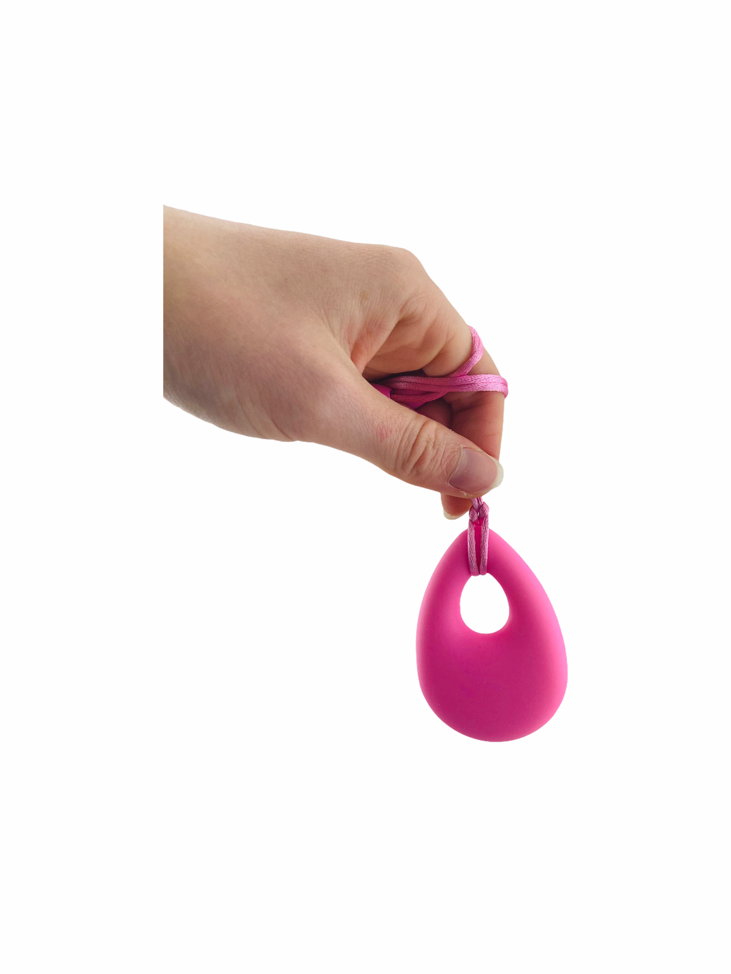 hand holding Chewy Charms Necklace Chew - Pink/Teardrop on white background