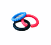 blue, black and red Ark Brick Bracelet Chews on top of each other with a white background