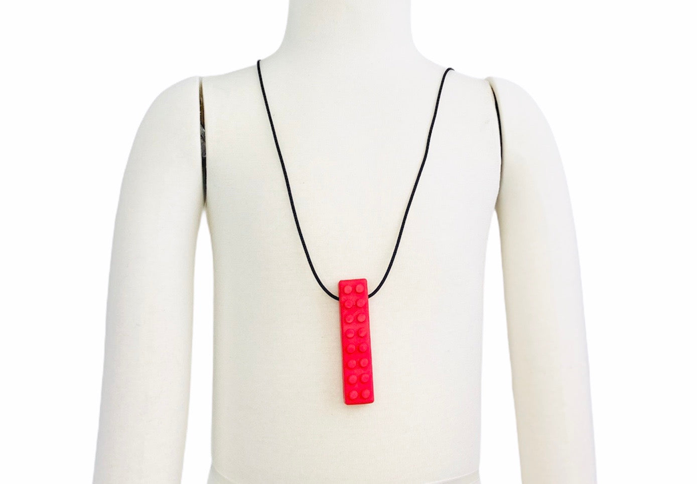 Ark Brick Stick Chew - Standard/Red placed around models neck on white background
