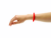 the red/standard Ark Brick Chew bracelet on a persons wrist