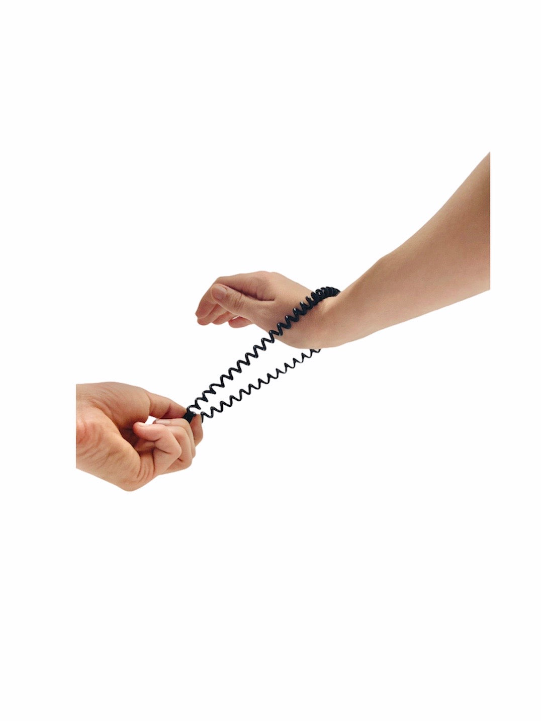 Wrist wearing the Chubuddy Springz Bracelet - Black with a white background