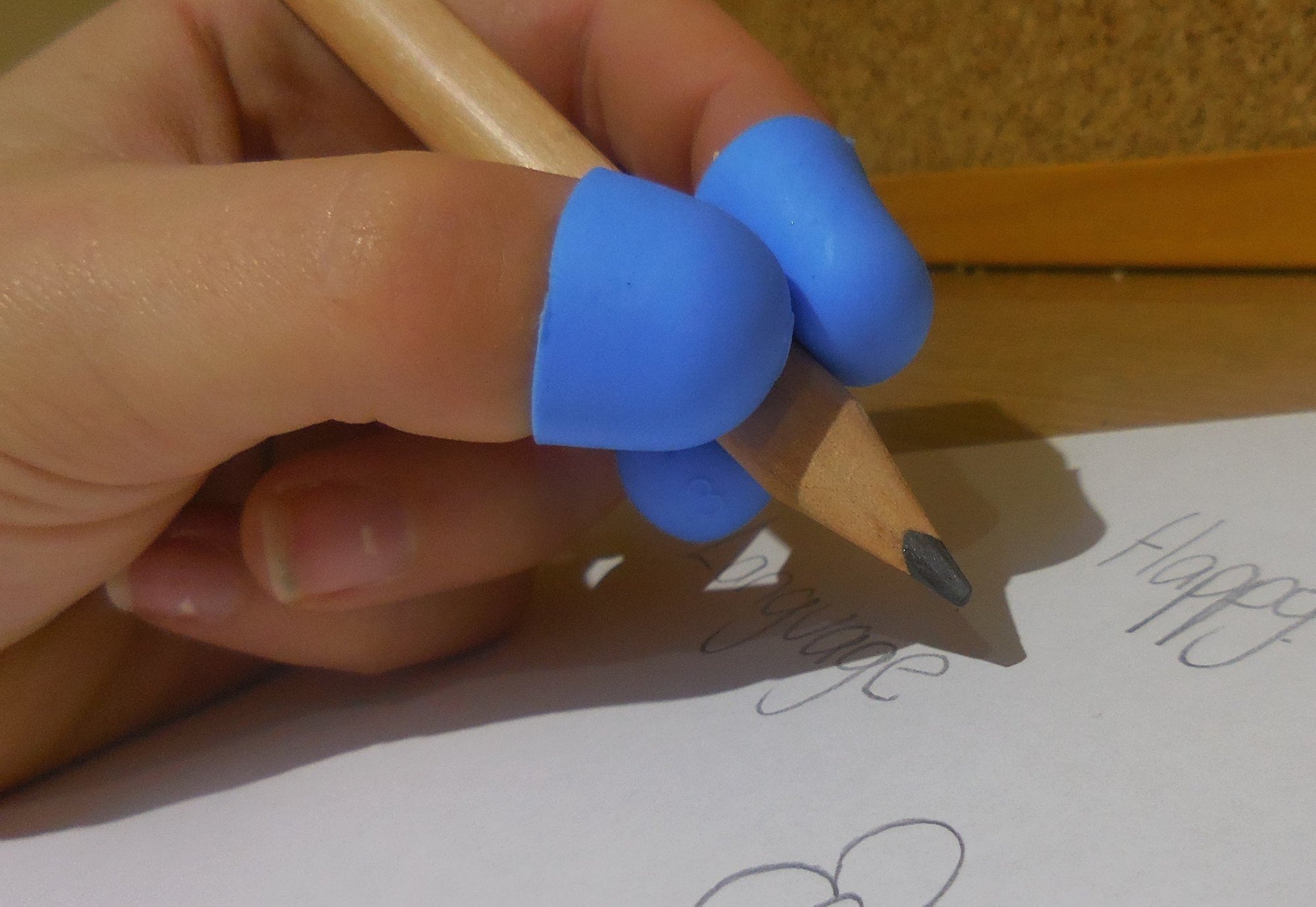hand using the TPG Pencil Grip Claw Small