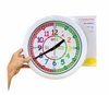 HAnd holding up EasyRead Wall Clock - Rainbow on white background