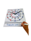 a hand writing with a blue marker on the EasyRead Twin Time Teaching Clock