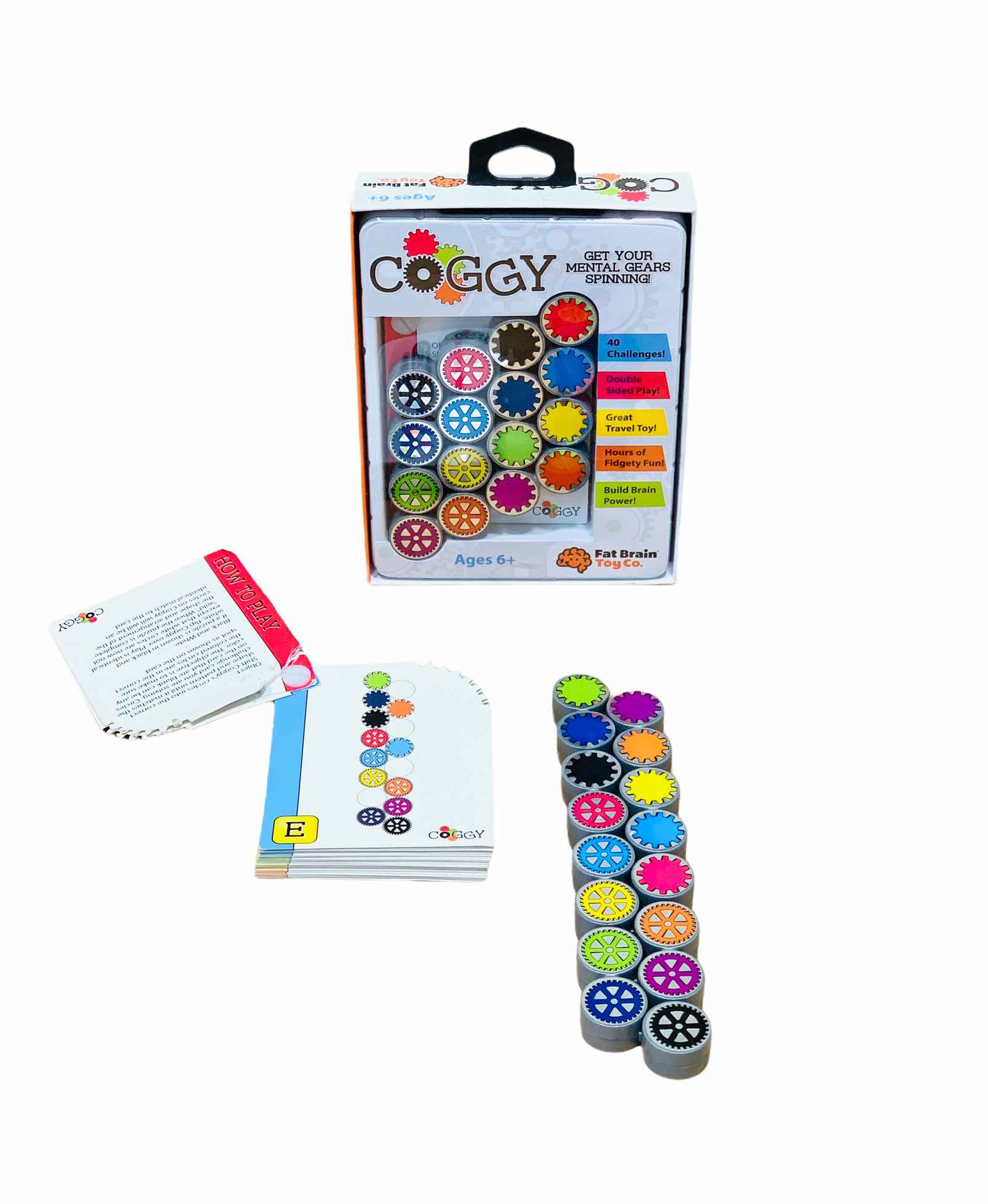 Fat Brain Coggy Puzzle laid out in front of packaging box with challenge book on white background