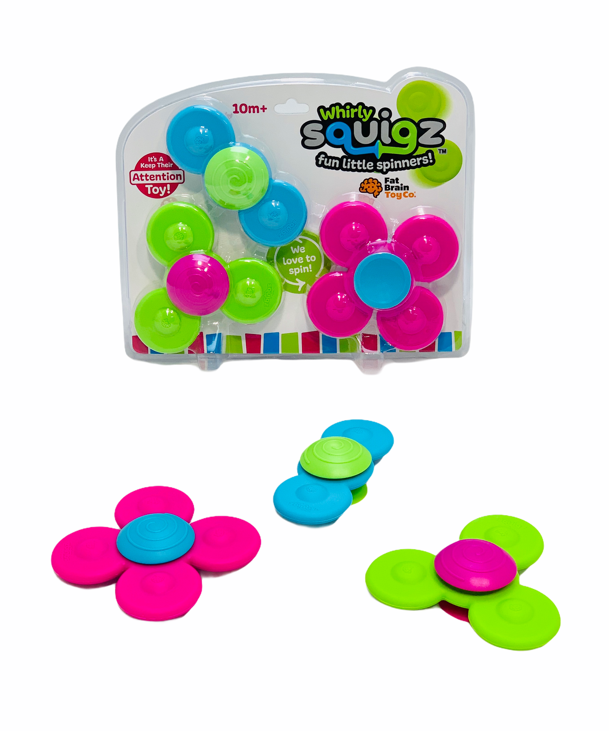 Fat Brain Whirly Squigz in pink, green and blue laid out in front of packet on white background