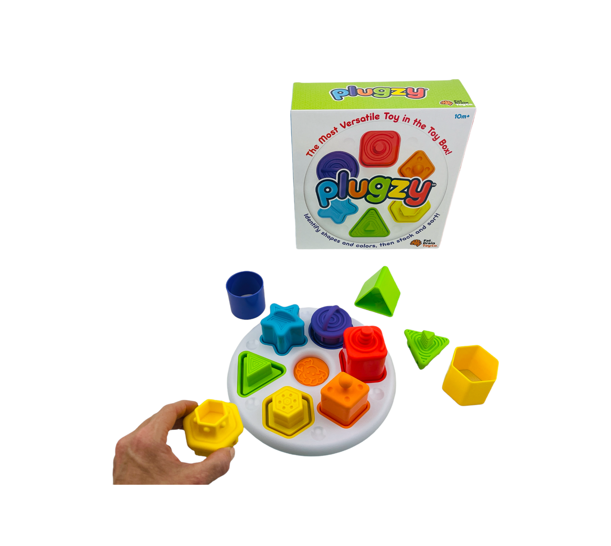 the Fat Brain Plugzy being played in front of it&#39;s box