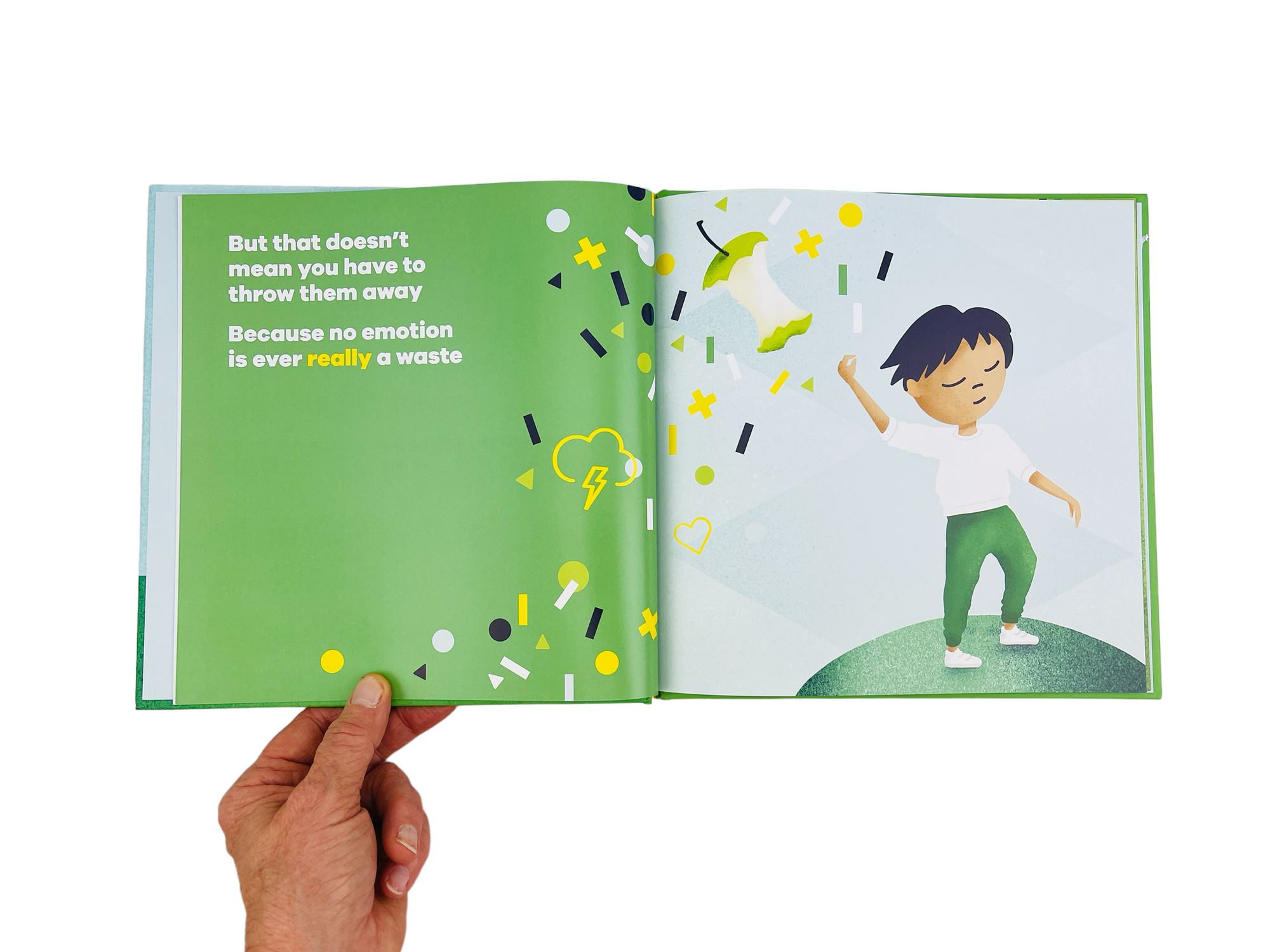 a person opening the How to Recycle Your Feelings Book