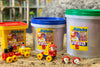 the Mobilo Junior, large and giant Bucket Construction Set standing next to each other with mobilo pieces in front