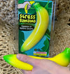 hand squeezing the Stress banana Toy