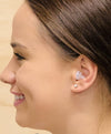 woman wearing the Vibes hi-fidelity noice reduction earplugs