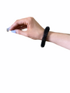 the XL Kaiko Wrist Spiky Fidget being worn by a white arm