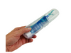 a hand holding the OraNurse® Unflavoured Toothpaste Case that contains toothpaste and toothbrush inside