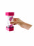 Hand holding giant pink 2 minute sand timer on white background