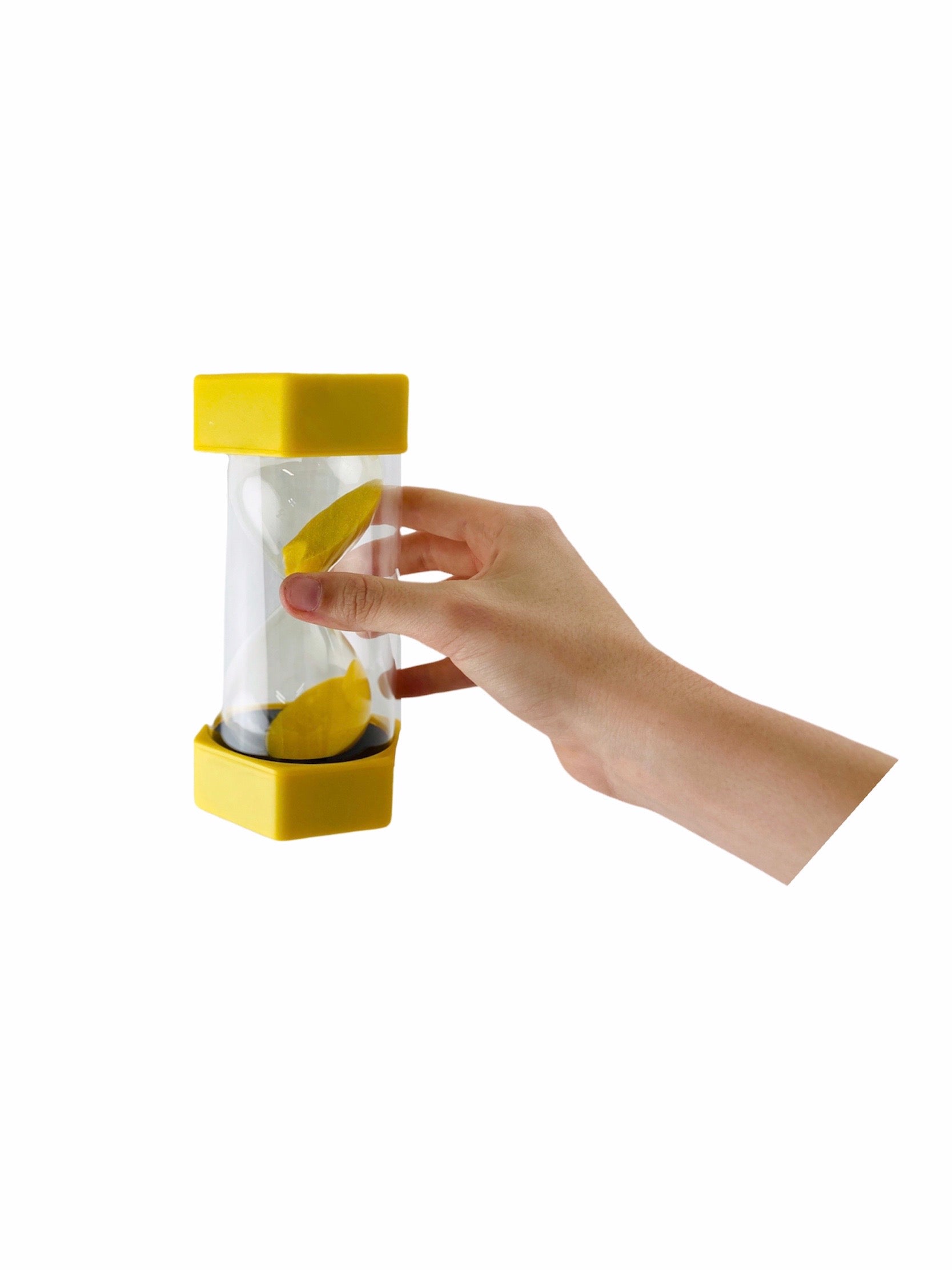 Hand holding Giant Yellow 3 minute sand timer on white background