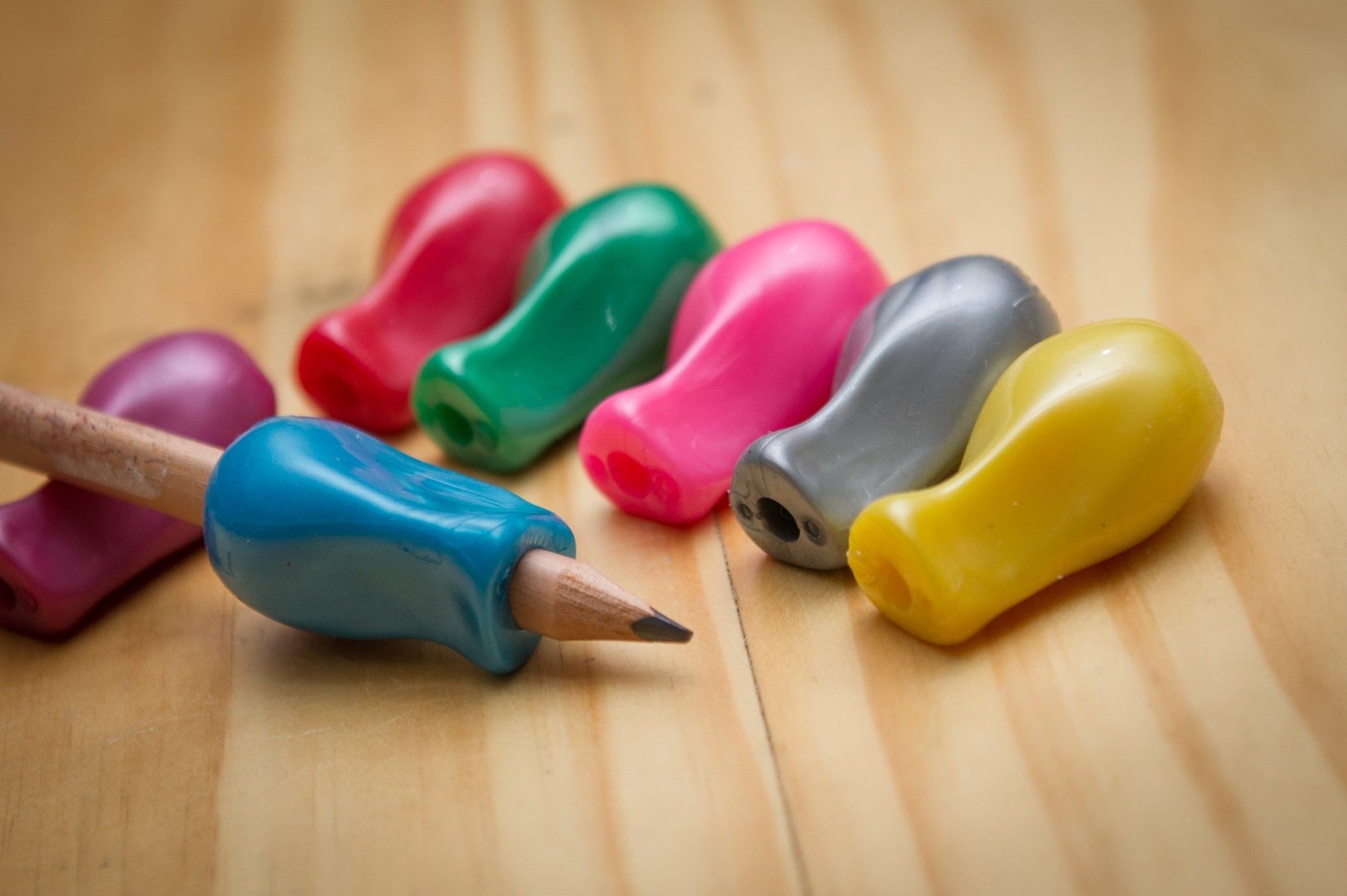 TPG Pencil Grip Jumbo on wooden table