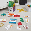 the Magnetic Tiles Toppers - Duo Animal Puzzle Pack 40pc placed on to magnetic toy structures in living room